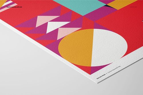 A3 fine art print mockup featuring geometric shapes in red, pink, yellow, and white on textured paper, angled view.