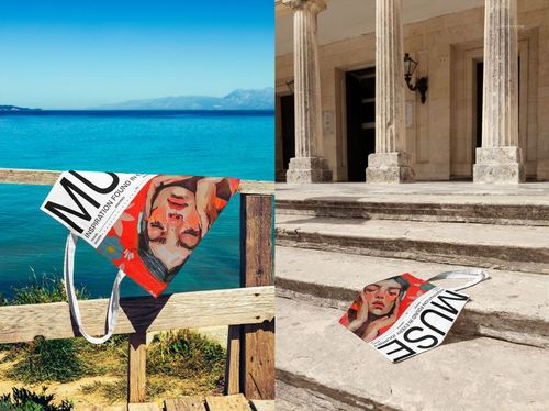 Classic tote bag mockup with creative design placed on stone steps near ancient columns in natural daylight.