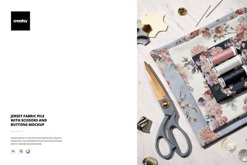 PSD mockup showing folded jersey fabric in floral designs, surrounded by scissors, buttons, and sewing threads from above.