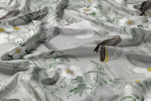 Polyester drapery fabric mockup featuring a botanical pattern with white flowers and green leaves, front view.