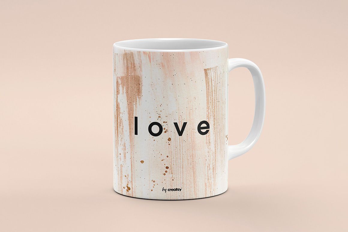 Front view of a white mug mockup with abstract brown paint streaks and bold black text on a neutral beige background.