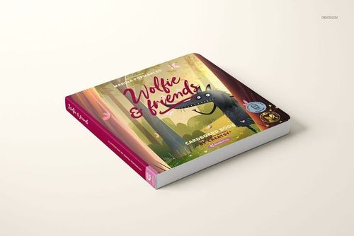 Square cardboard baby book mockup featuring colorful woodland artwork and wolf character, displayed at an angle.