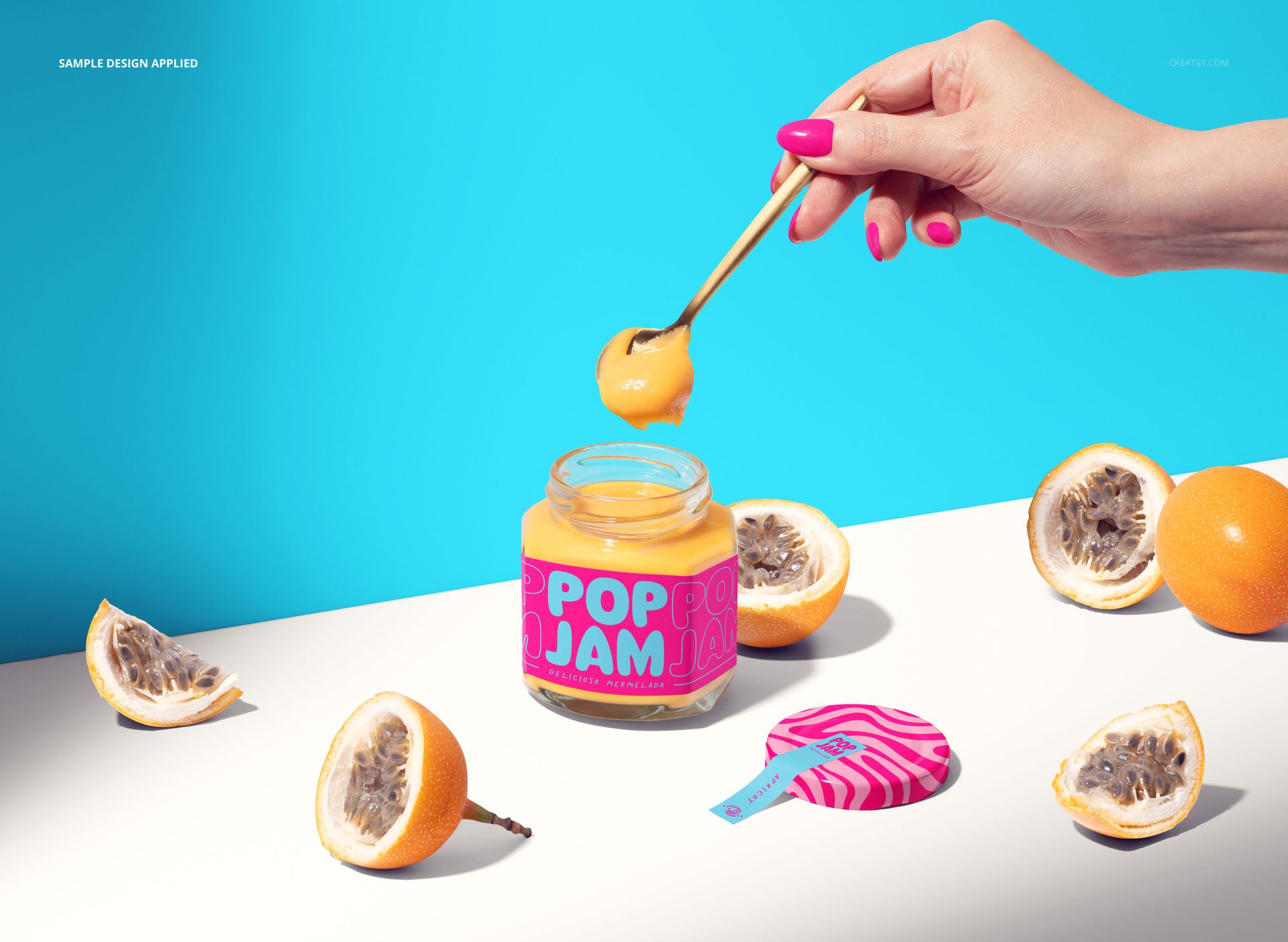 PSD mockup of a jam jar with bright yellow jam, bold label design, and passion fruit halves on a clean, blue backdrop.