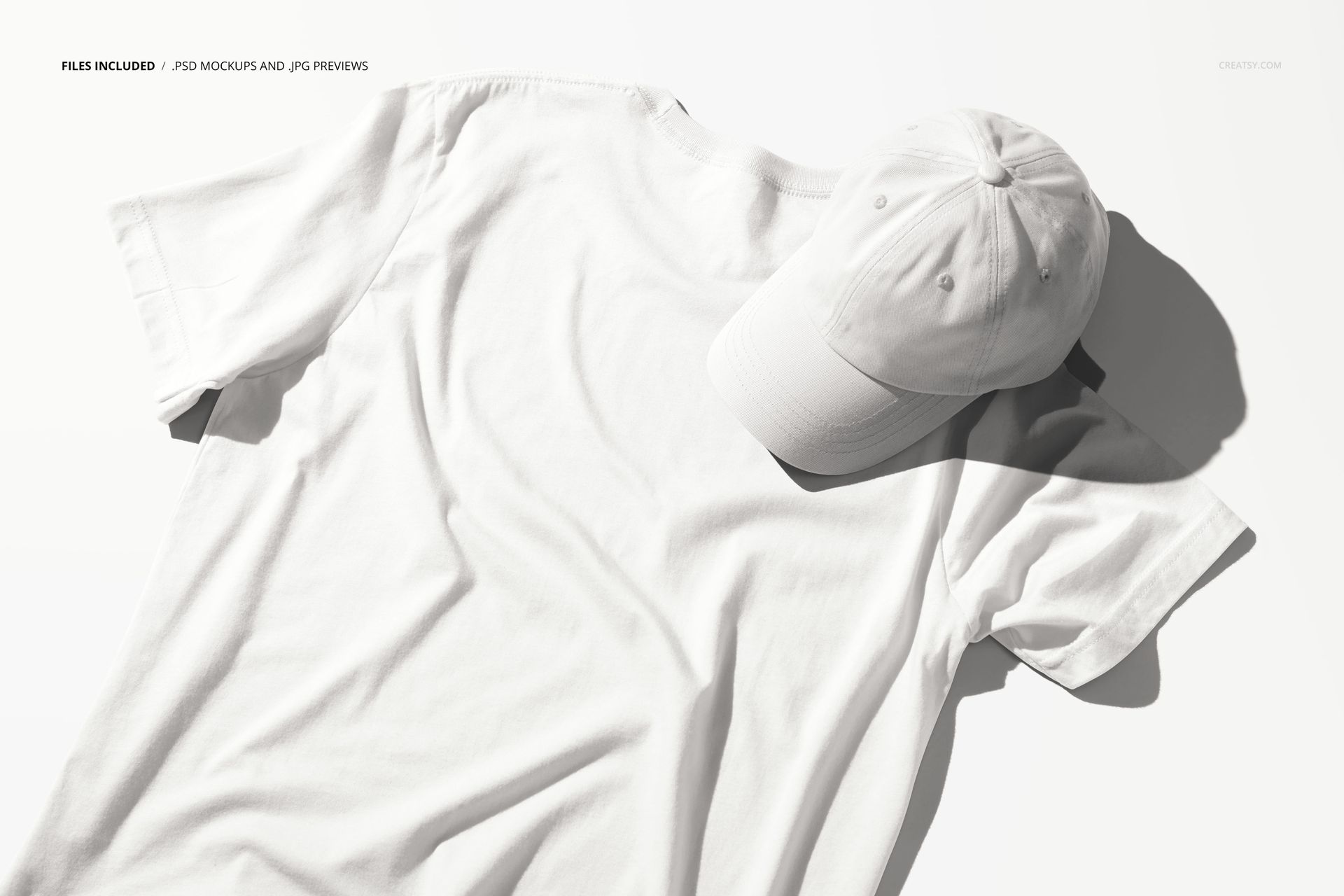 PSD mockup showing a plain white t-shirt and cap arranged side by side on a clean, light background.