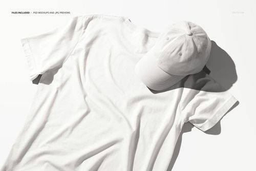 PSD mockup showing a plain white t-shirt and cap arranged side by side on a clean, light background.