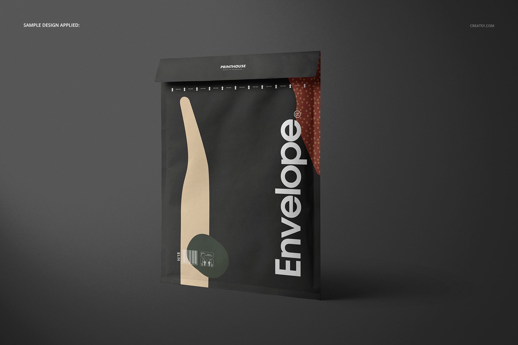 Envelope mockup featuring a black square envelope with bold white lettering and geometric accents, angled front view.