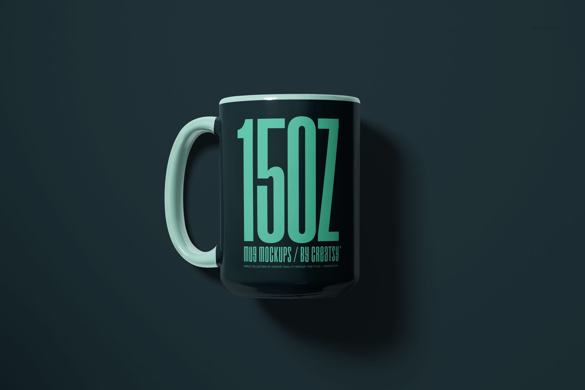 Front view of a black 15oz mug with large turquoise text, shown on a dark background in a mockup scene.