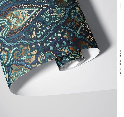 Detailed paper wallpaper mockup roll with ornate teal, blue, and gold design, displayed on a plain background in bright light.