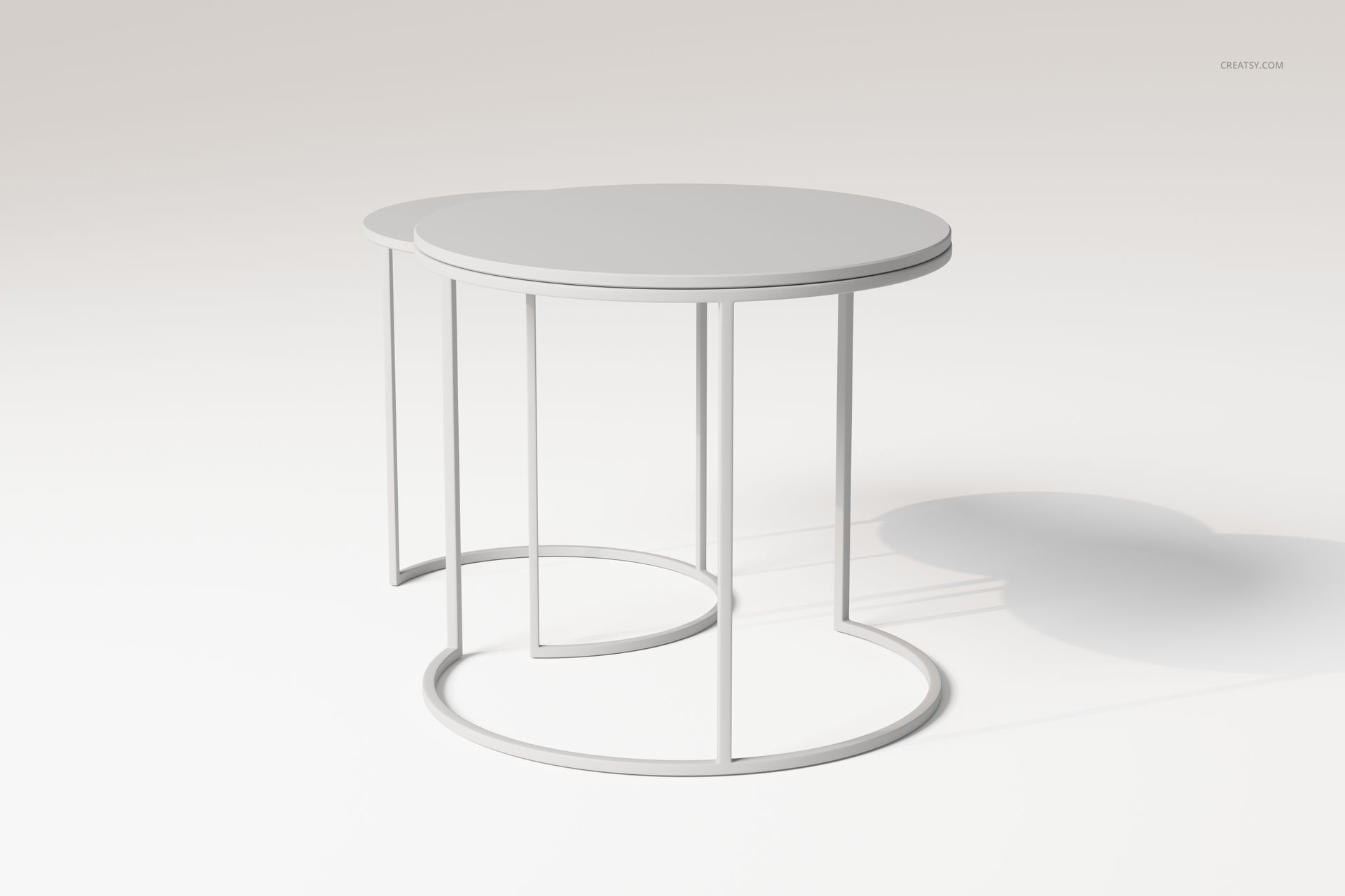 Nesting coffee table set with two round tables in light gray, shown from a front angle on a plain background.