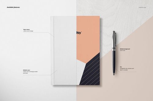Hardcover notebook mockup featuring a split-color geometric cover, shown from above with a pen on a wooden desk.