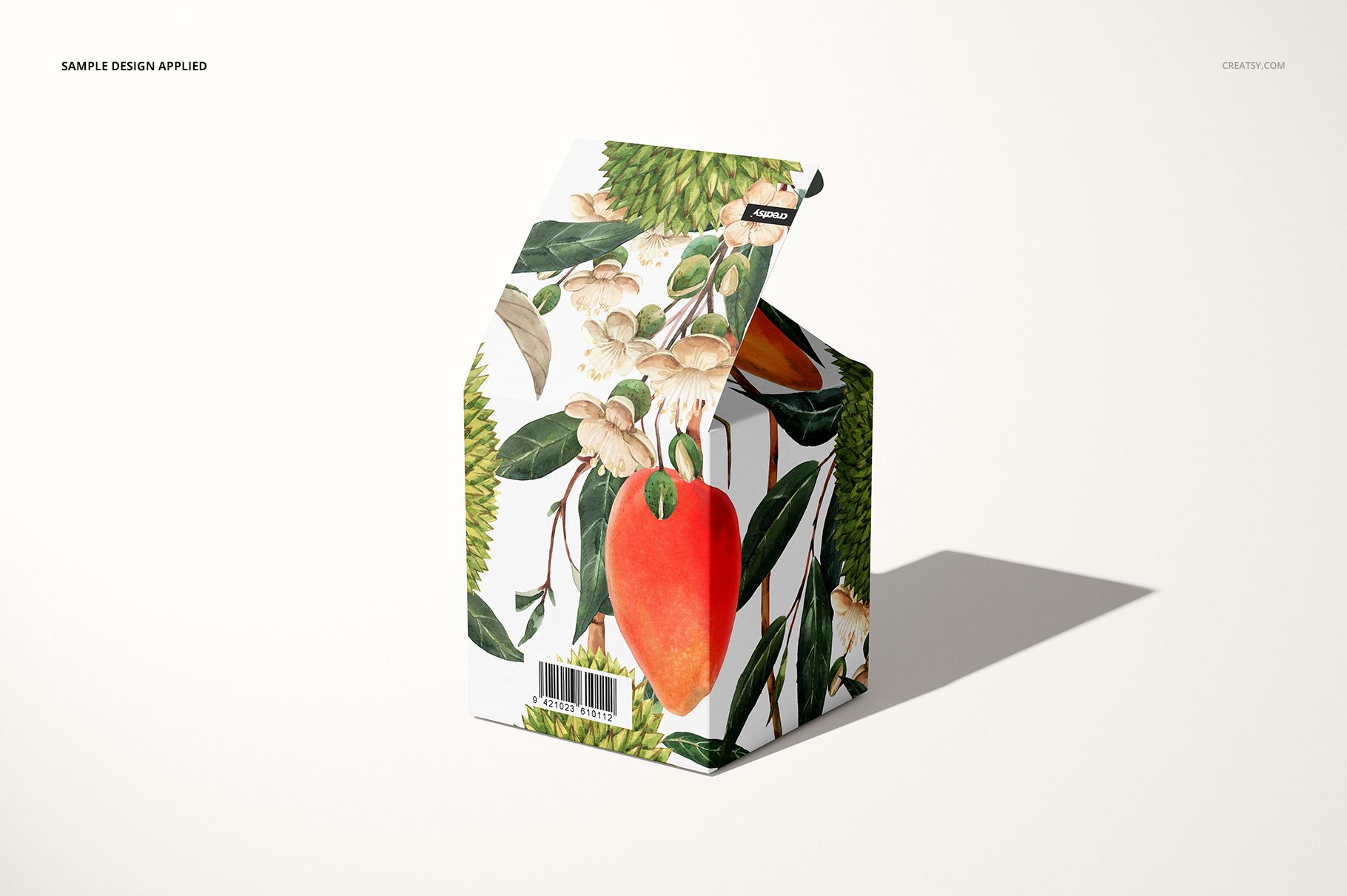 30cl candle box mockup with an illustrated design of leaves, flowers, and fruit, shown on a light background.