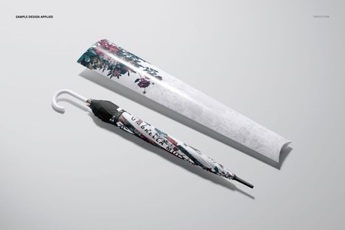 Umbrella mockup featuring a folded umbrella with floral print and coordinating packaging sleeve in top view.