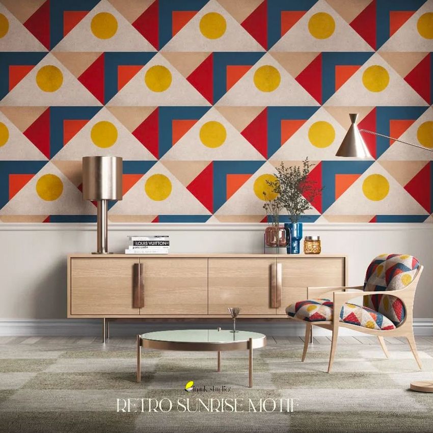 Mid-century interior wallpaper mockup showing a geometric pattern with red, blue, and yellow shapes above a wooden sideboard.