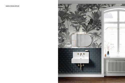 Vintage bathroom mockup featuring a white sink, brass fixtures, oval mirror, and tropical wallpaper above dark blue tiles.
