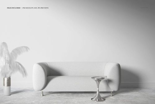PSD mockup showing a modern lounge sofa with rounded edges, a silver accent table, and a white ornamental plant.