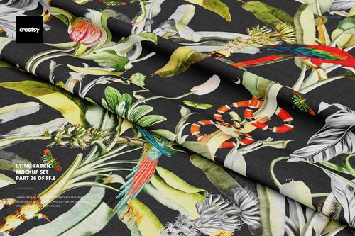 PSD mockup of fabric layers showing botanical and animal motifs in bright colors over a dark base, close-up scene.