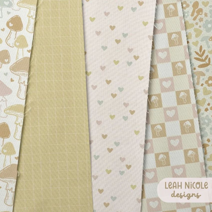 Cotton fabric sample mockup showing five fabric swatches with pastel patterns, including hearts, mushrooms, and checkered designs.