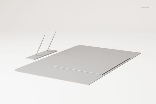 Minimalist office desk pad set in light gray, shown from a front angle with matching accessories on a plain background.