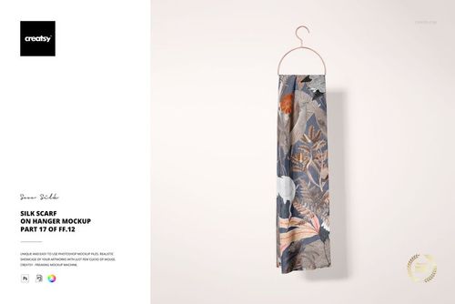 Front view of a silk scarf featuring a mix of floral and geometric designs, displayed on a simple hanger in a mockup scene.