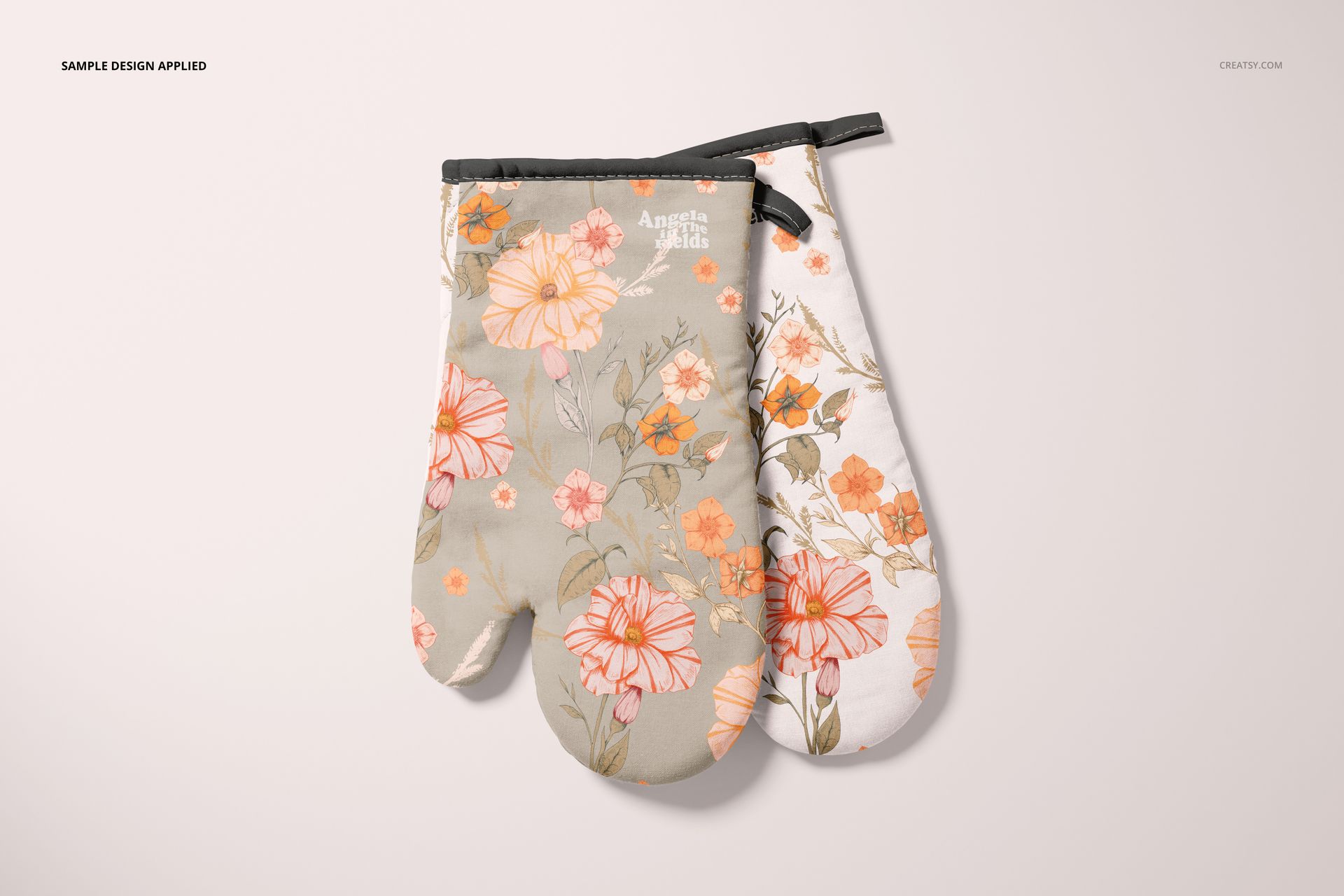 Oven mitt PSD mockup set with botanical prints in pastel colors, arranged side by side on a neutral background.