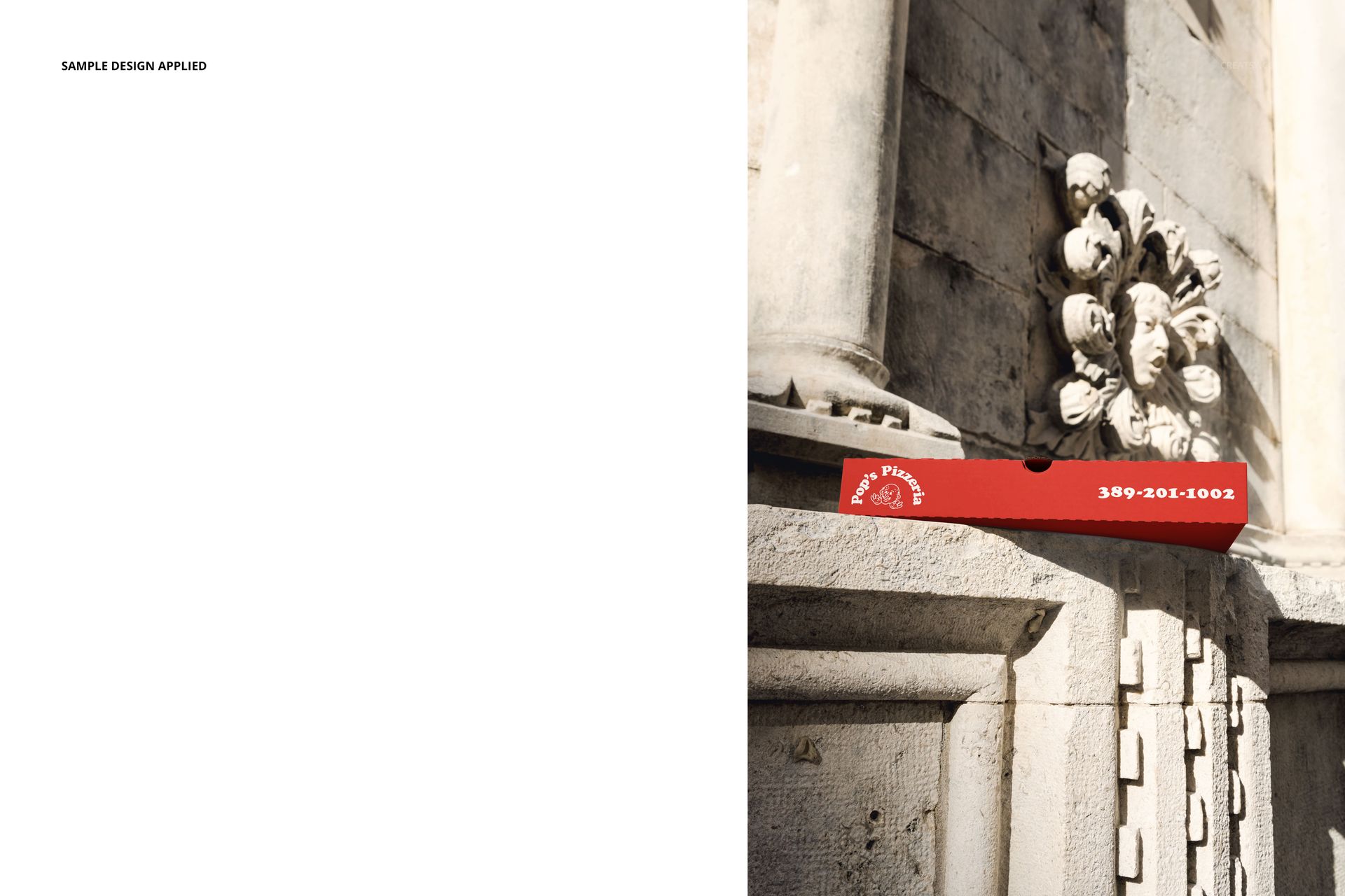 Rectangular pizza box mockup with red design placed against an antique Italian stone facade in bright sunlight.