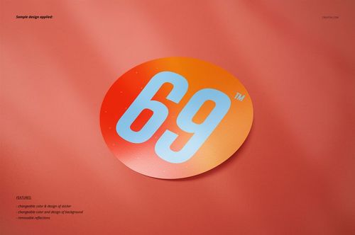 Sticker mockup showing a circular sticker with orange and red hues and bold blue text, placed on a matte background.