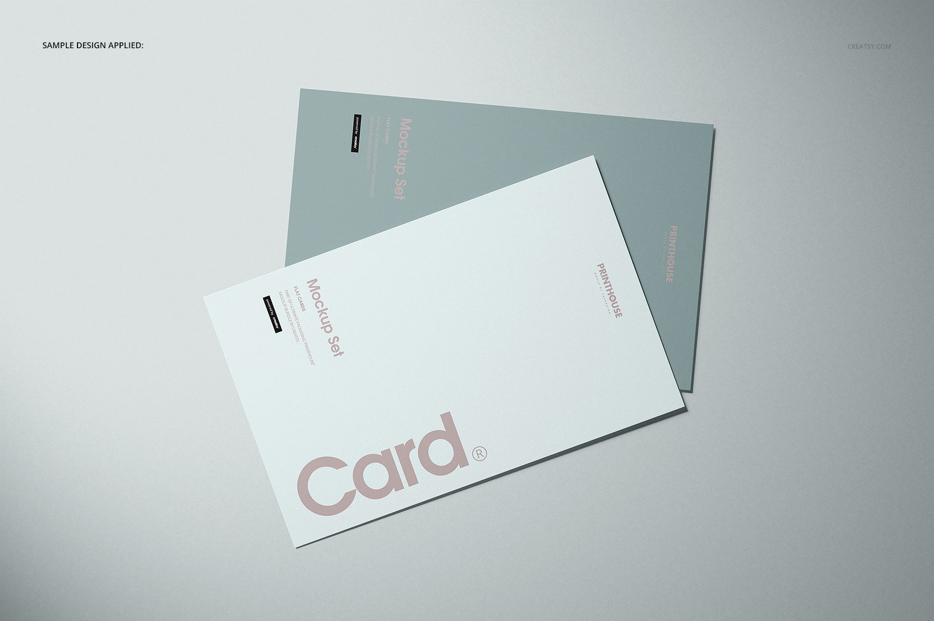 Flat cards mockup set featuring two overlapping paper cards with simple text, viewed from above on a neutral background.
