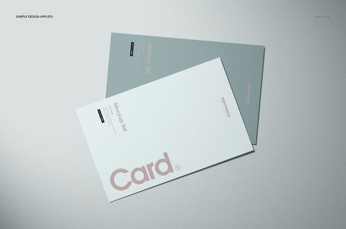 Flat cards mockup set featuring two overlapping paper cards with simple text, viewed from above on a neutral background.