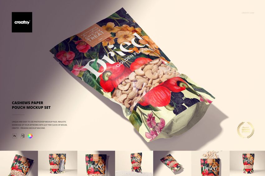 Front view of a paper pouch mockup featuring cashews, colorful floral illustrations, and a golden label on a light surface.