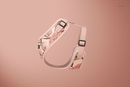 PSD mockup of a dog harness featuring pastel pink tones and botanical design, displayed on a plain pink backdrop.