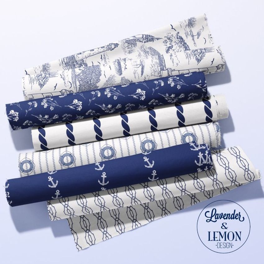 Fabric rolls mockup showing six rolled fabrics with coastal and nautical patterns in blue and white on a light background.