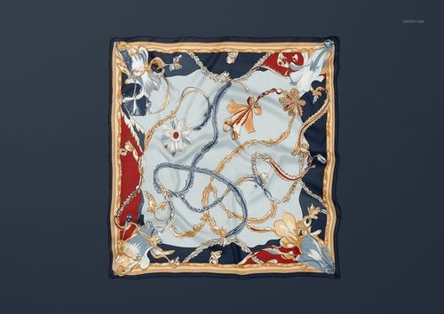 85x85cm silk scarf mockup showing ornate design with gold chains and flowers, viewed from above on a navy backdrop.