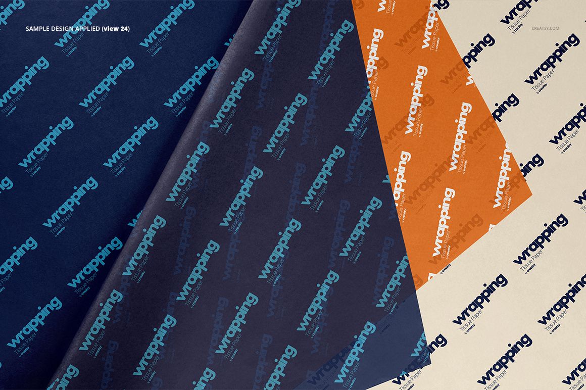 Three sheets of wrapping tissue paper mockup displayed from a top view, featuring blue, orange, and cream colors.