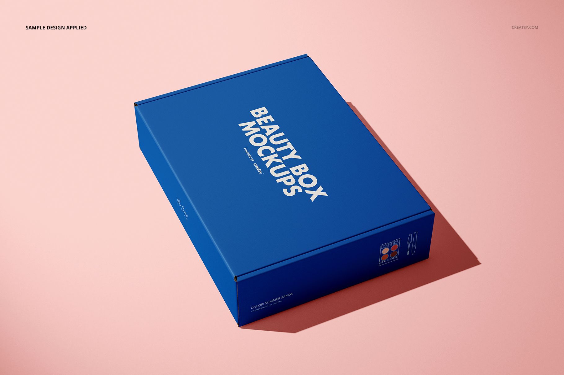Rectangular mailing box mockup in blue with white text, shown in an angled front view on a light pink surface.