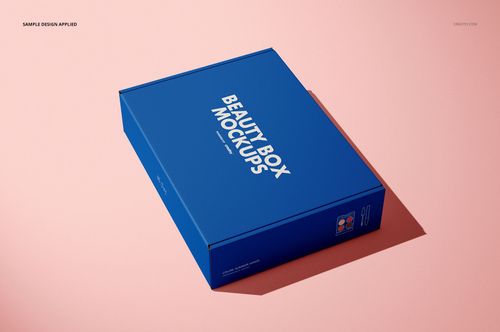 Rectangular mailing box mockup in blue with white text, shown in an angled front view on a light pink surface.