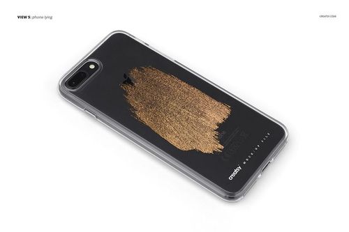 Clear iPhone 7 Plus case mockup with gold brushstroke design, shown from a top angle on a white surface.