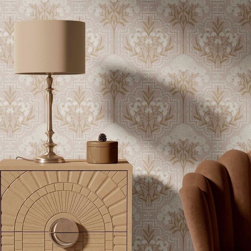 Drum lamp shade mockup displayed on a metallic lamp beside a beige geometric cabinet, with floral wallpaper in the background.