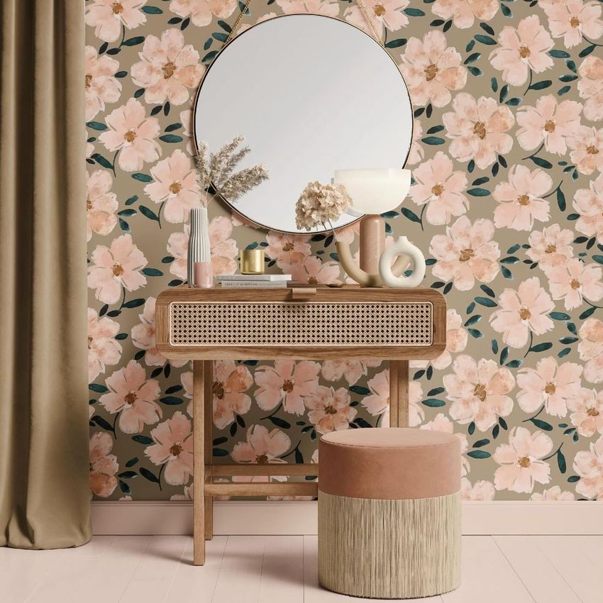 Dressing table mockup featuring a round mirror above a wooden vanity with floral wallpaper and decorative objects on the tabletop.