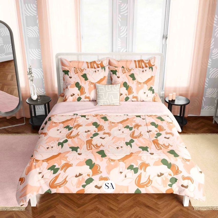 Boho bedroom mockup showing a bed with a floral-patterned coverlet and pillows in peach, white, and green tones.