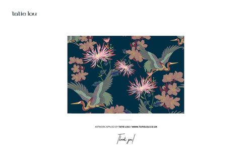 Rectangular wallpaper mockup featuring a dark blue background with cranes and pink floral patterns in a front view.