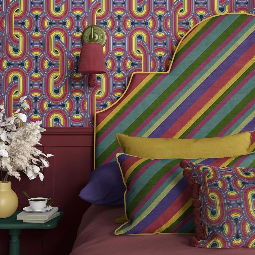 Bedroom pillow, headboard, and wallpaper mockup featuring bold geometric patterns in vibrant colors with a retro style.