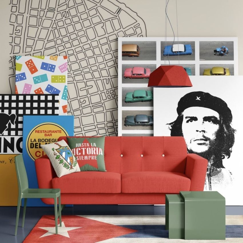 Modern sofa mockup scene featuring a red sofa with colorful pillows, geometric wall art, and a map mural in the background.