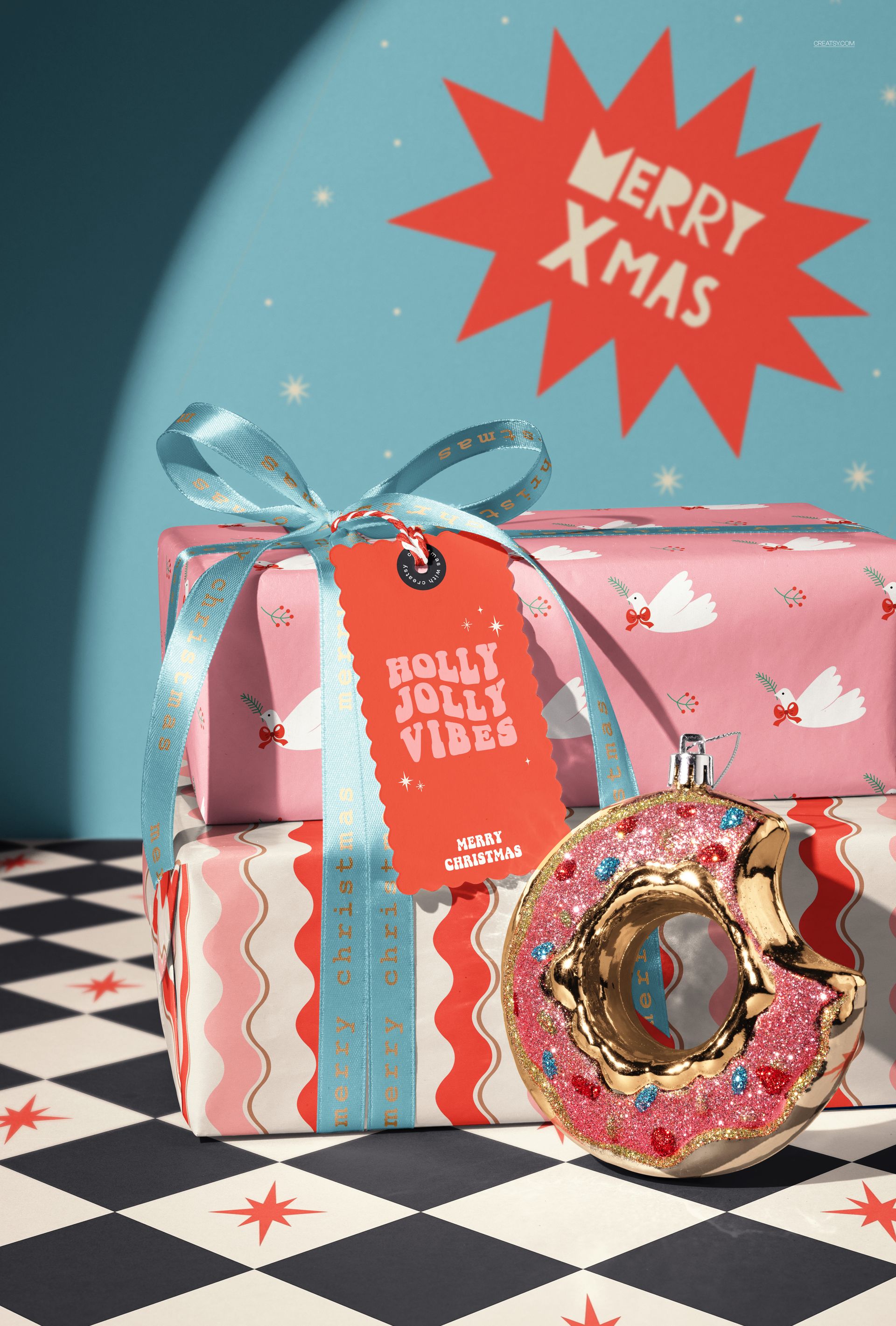 Christmas PSD mockup featuring two decorated gift boxes, donut ornament, and a pink starburst Merry Xmas sign.