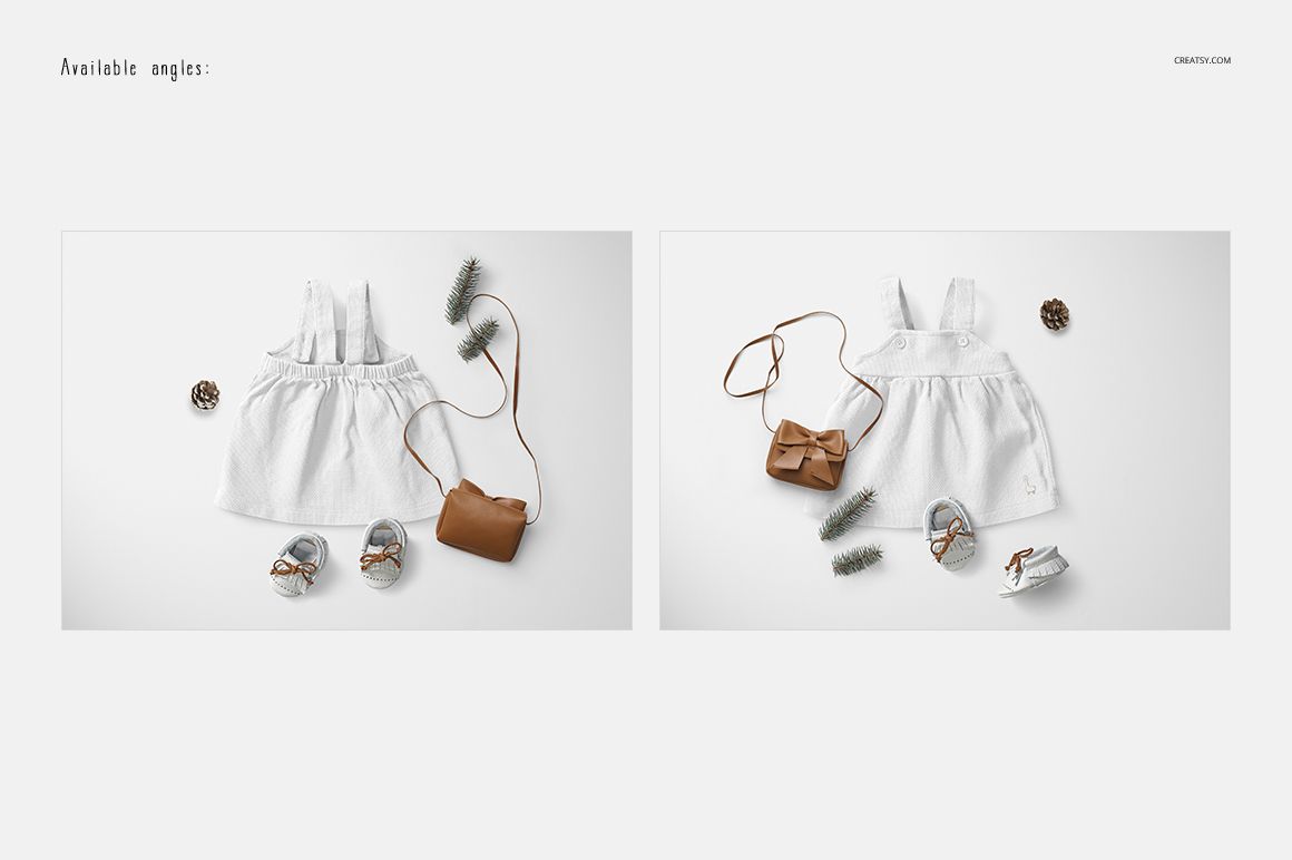 Baby dress mockup shown in flat lay style with matching sandals, brown purse, pine cones, and greenery on a light surface.