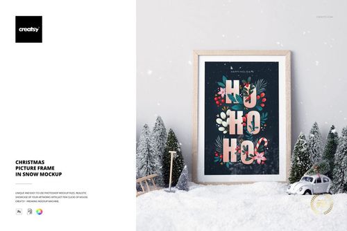 Front view of a Christmas picture frame mockup in snow, with tiny pine trees and a white toy car nearby.
