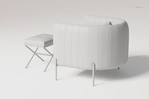 Modern armchair with matching ottoman in white upholstery, shown from a rear angle on a minimal light background.