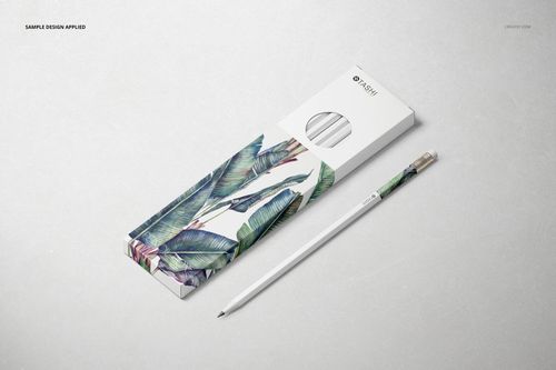 Pencil box mockup featuring green leaf design, shown with coordinating pencil on a neutral background, top perspective.