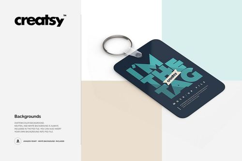 PSD mockup of a rectangular keychain with a silver ring, shown from a top angle on a white and pastel background.