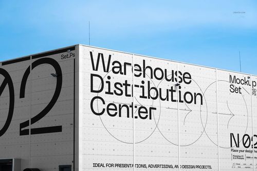 PSD mockup of a warehouse exterior featuring prominent black lettering and grid pattern on white facade with blue sky background.
