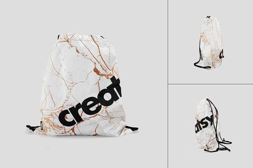 PSD mockup of a drawstring bag with a white and gold marble design, black strings, displayed on a neutral background.